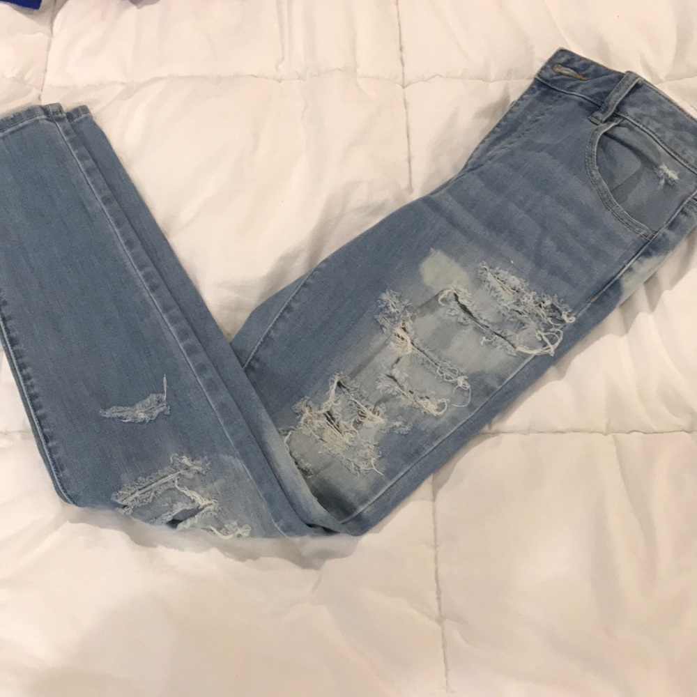 distressed light denim jeans